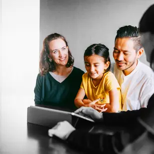 Family talking to a mortgage broker