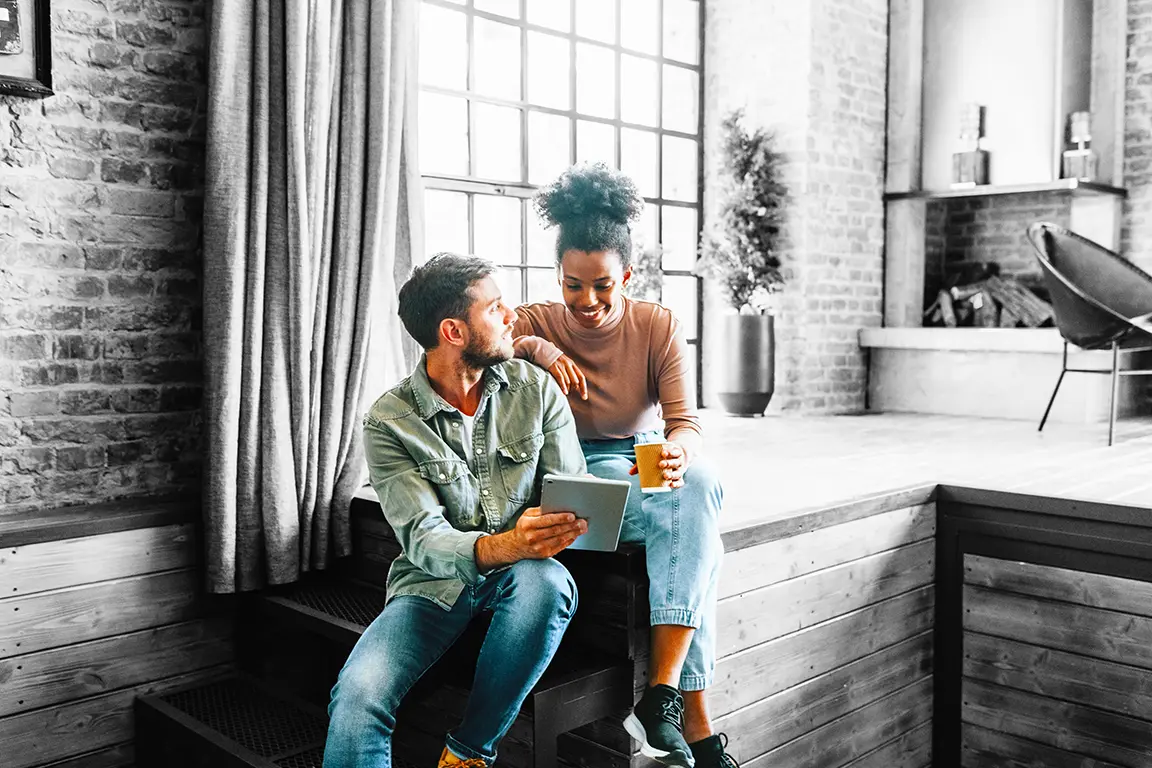 Couple looking at an ipad
