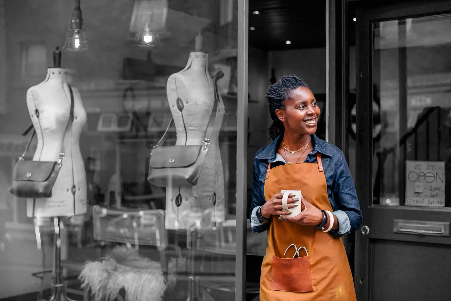 Business owner outside shop 