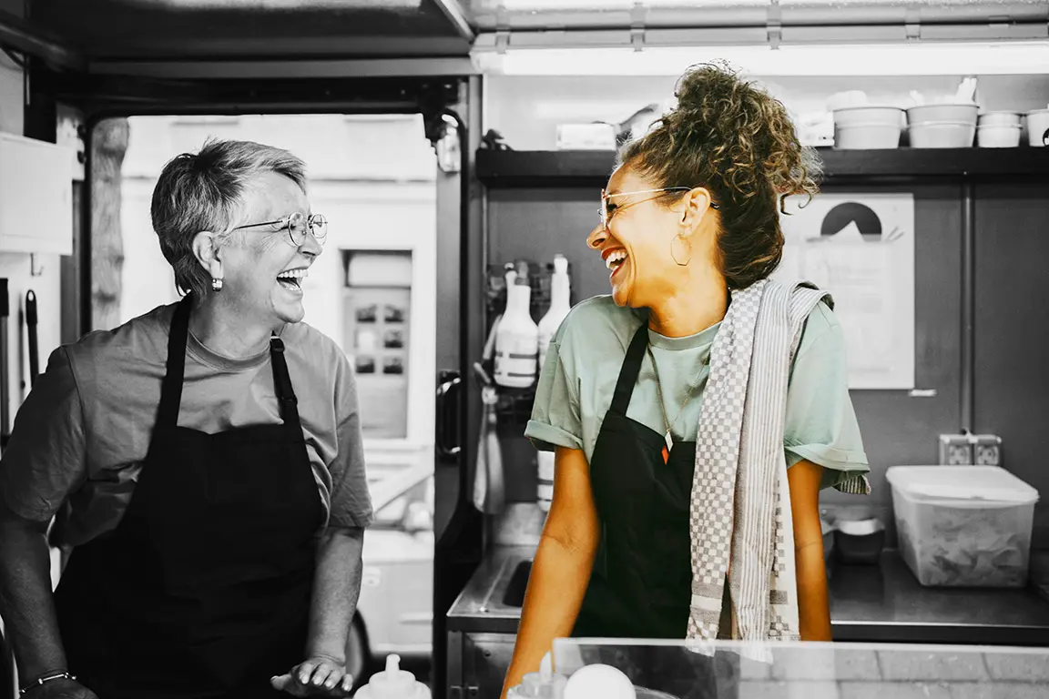 Restaurant workers laughing