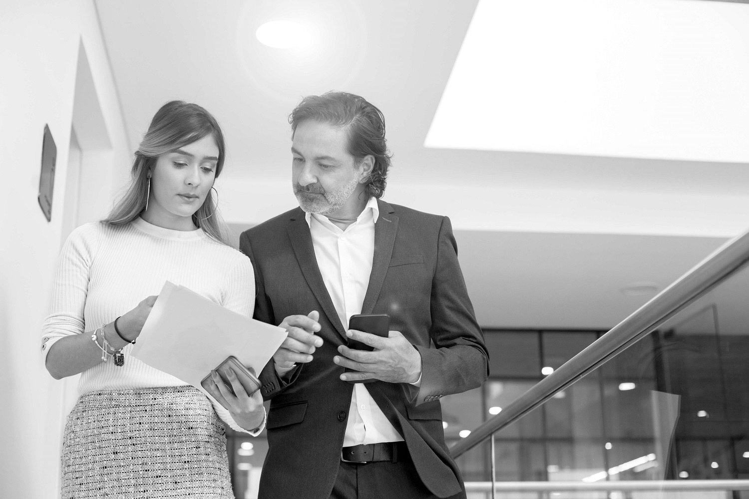 Business people looking at documents 