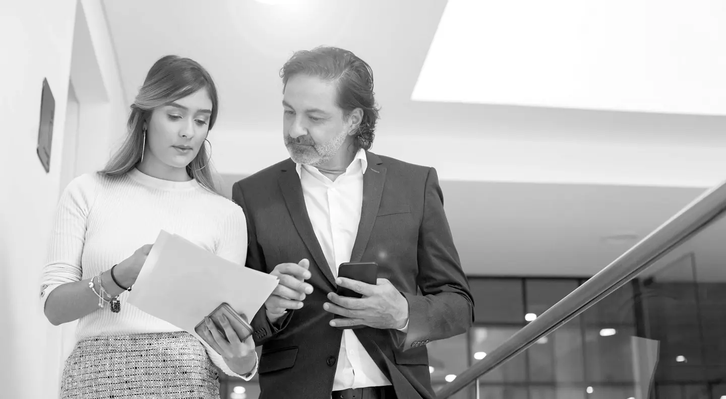 Business people looking at documents 