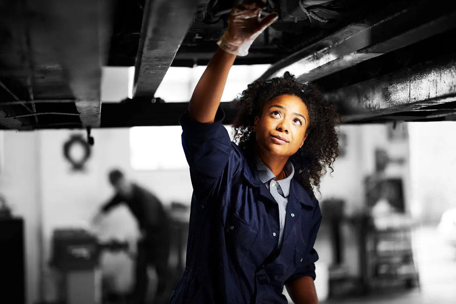 Car mechanic working on car 