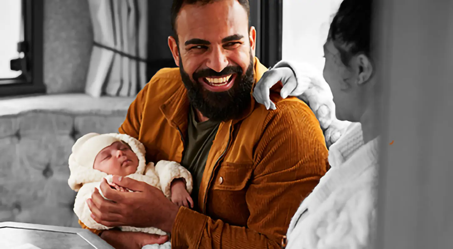 Father holding baby