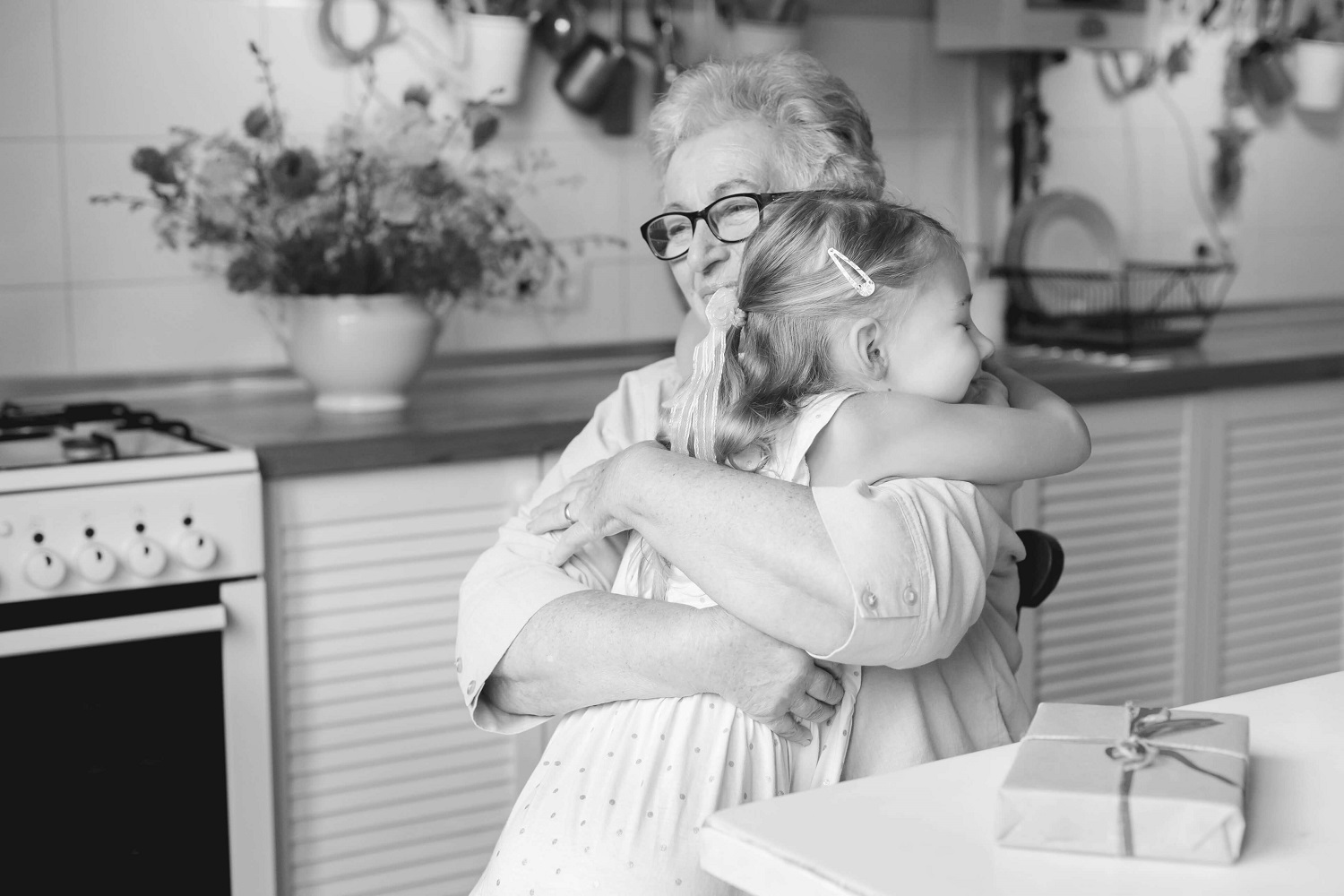 Woman hugging young girl 