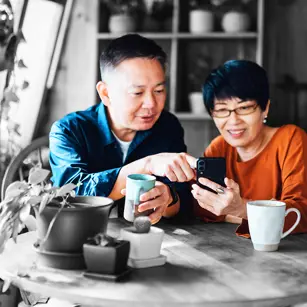 Couple looking at something on a phone